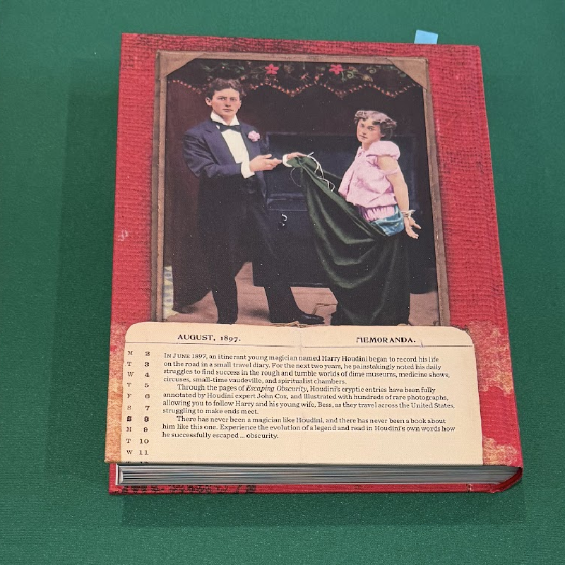 Back cover of Escaping Obscurity, showing Harry and Bess Houdini above a facsimile diary page dated August 1897
